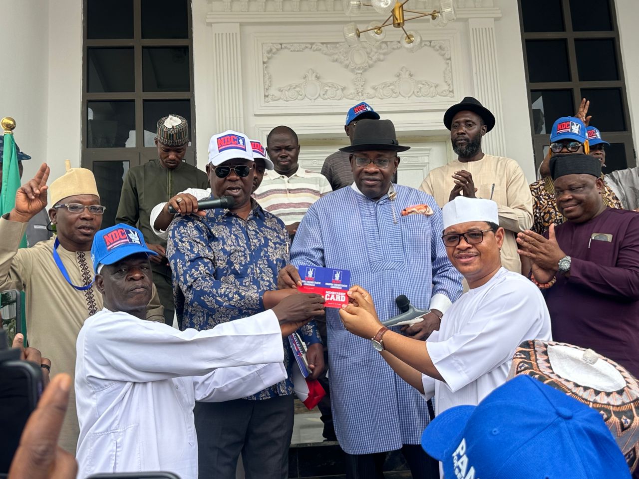 Former SDP AMAC Chairmanship Candidate, MC Tagwaye, Defects to NDC with Supporters